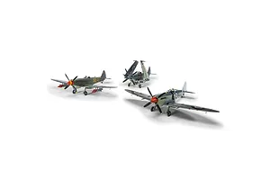 Three assembled and painted plastic model fighter aircraft shown against a plain white background.