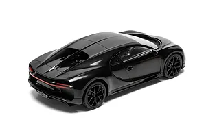 Rear three-quarter studio view of the assembled black Bugatti Chiron plastic model car set against a clean white background.
