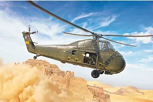 Artwork of an Italeri H-34 helicopter flying over a desert landscape kicking up dust.
