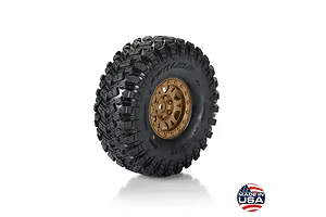 Pro-Line 1.9 inch crawler tyre mounted on a bronze Impulse rim with aggressive tread pattern against a white background.
