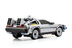 Rear-three-quarter studio shot of the Kyosho First Mini-Z Back to the Future DeLorean RC car, showing detailed time machine modifications.
