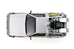Top-down studio view of the Kyosho First Mini-Z Back to the Future DeLorean RC car showcasing its detailed rear time machine equipment.