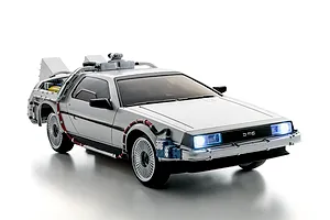 Kyosho First Mini-Z Back to The Future DeLorean RC car shown from a front-three-quarter studio angle with lit headlights.