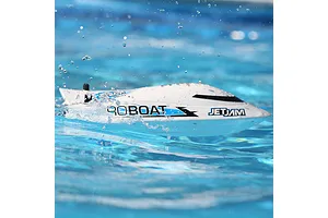 Pro Boat Jet Jam V2 12-inch electric RC speed boat in white, speeding across blue pool water with splashing water droplets.