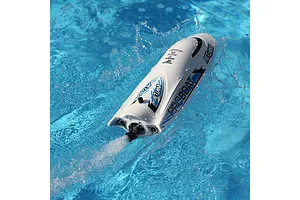 Pro Boat Jet Jam V2 12-inch electric RC speed boat in white running on water, showing a water spray jet stream from the stern.