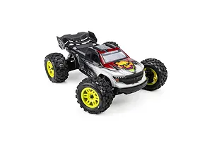 Monster RC truck installed with Pro-Line Badlands MX MT tyres on yellow split six rims against a white background.