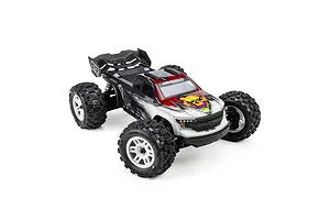 Pro-Line 1/16 Badlands MX MT tyres mounted on white split-six rims installed on an RC monster truck.