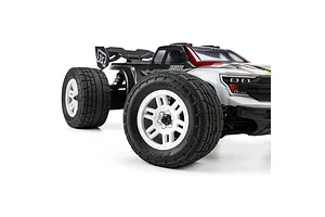 Pro-Line Menace Street tyres on white split six rims installed on an RC truck against a white background.