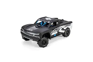 Pro-Line 2019 Chevy Silverado Trophy Truck body shell in matte black mounted on an RC chassis with wheels against a white background.