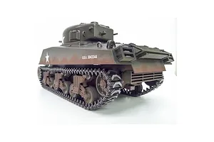 Rear three-quarter view of the Taigen M4A3 Sherman RC tank showing tracks, suspension, and weathered olive drab hull.
