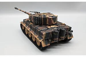 High-angle studio shot of the Taigen German Tiger I RC tank in a camouflage pattern, showing tracks, turret, and barrel against a plain white background.