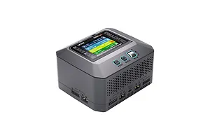 SkyRC Q500neo 1000W AC/DC four-port smart charger showing its color LCD screen, control buttons, and charging ports.