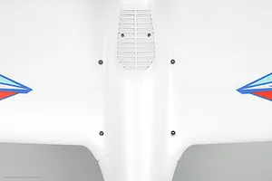 Top-down view of the white foam wing mounting area on the Arrows RC Prodigy 1400mm trainer airplane.