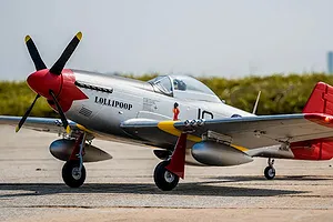 Arrows RC P-51 Mustang 850mm warbird RC airplane parked on an outdoor tarmac surface