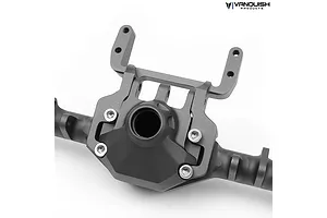 A close-up of a Vanquish Products black aluminium servo mount kit attached to an RC axle housing, featuring a matte finish and silver hex screws.