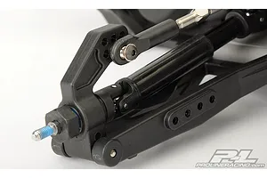 Close-up of a Pro-Line rear hub assembly installed on an RC vehicle suspension arm.