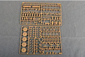 Two tan plastic model kit sprues containing various small parts, wheels, and structural components for a 1/35 scale military vehicle model.