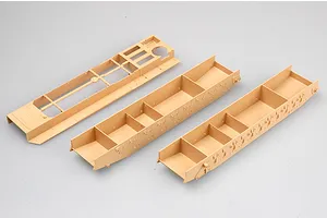 Three tan plastic model tank hull components from a Trumpeter 1/35 scale model kit on a white background.