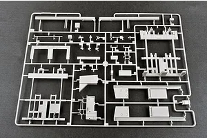 A grey plastic sprue containing various unpainted model parts for a 1/35 scale military vehicle kit.