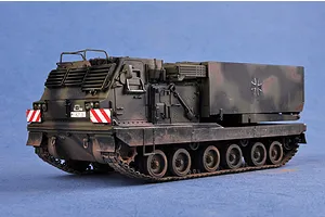 A 1/35 scale model of a German MARS multiple launch rocket system vehicle, painted in camouflage, viewed from a front-three-quarter angle.