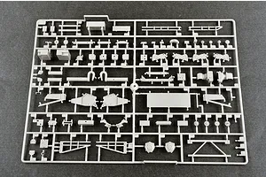 A grey plastic sprue containing various unpainted model parts for the Trumpeter 1/35 BTM-3 trench digger kit.