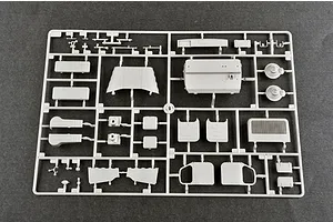 A grey plastic sprue containing various unpainted model parts for the Trumpeter 1/35 BTM-3 High Speed Trench Digger kit.