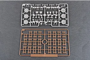 Two plastic model kit sprues on a grey background, one grey with tank parts and one brown with track links.