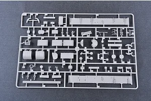 A grey plastic sprue containing various unpainted model tank parts for a 1/35 scale military model kit.