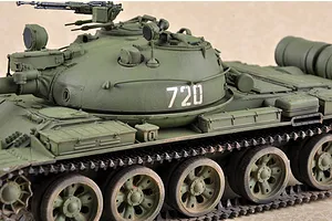A detailed 1/35 scale model of a Russian T-62 tank, painted in olive green with the number 720 on the turret.