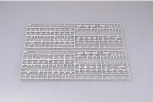 Two identical grey plastic model kit sprues containing various small ship parts on a plain background.