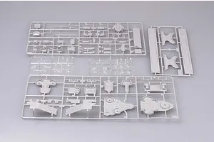 Several grey plastic model kit sprues containing various ship parts laid out on a plain grey background.
