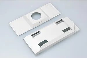 Two unpainted light grey plastic model kit parts for a military vehicle, likely a hull and deck section, viewed from above on a plain background.
