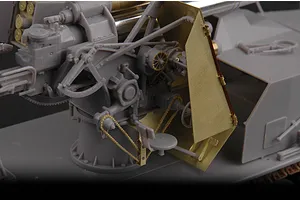 Close-up of a 1/35 scale model of a German 8.8cm Flak 18 gun, showing intricate grey plastic and brass photo-etched parts on a dark background.