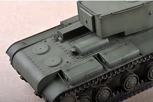 High-angle close-up of a 1/35 scale olive green Russian KV-220 tank model kit showing the engine deck and turret base.