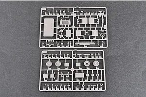 Two grey plastic model kit sprues containing various truck parts for a 1/35 scale model.