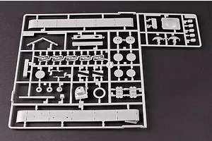 A grey plastic sprue containing various tank model parts for a 1/35 scale KV-1 tank kit.