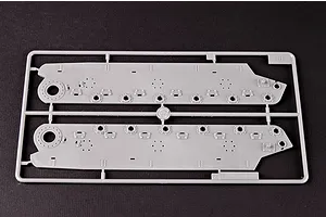 A grey plastic sprue containing two tank hull side panels for a 1/35 scale model kit.