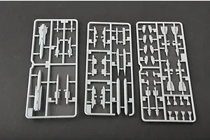 Three grey plastic model kit sprues containing various missile and weapon parts for a 1/72 scale aircraft model.