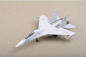 A high-angle studio shot of a 1/72 scale plastic model of a Russian Su-30MKK Flanker G fighter jet, featuring Chinese Air Force markings.