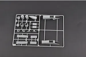A grey plastic sprue containing various model aircraft parts for a 1/72 scale Su-27 fighter jet kit.