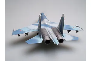 A rear-view perspective of a scale model Russian Su-27UB jet fighter, featuring a blue and grey camouflage paint scheme and red star insignias.