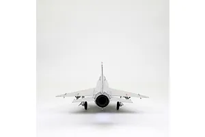 Rear view of a silver MiG-21F-13 model aircraft showing the engine exhaust nozzle, landing gear, and delta wings against a white background.