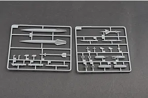 Two grey plastic model kit sprues containing various missile and weapon parts for a 1/48 scale aircraft model.