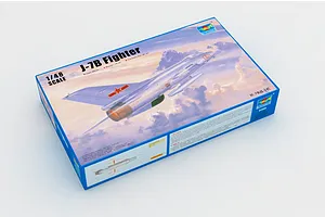 A Trumpeter 1/48 scale J-7B Fighter jet plastic model kit box, featuring an illustration of the aircraft in flight against a cloudy sky.
