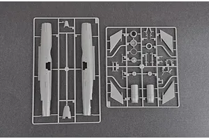 Two grey plastic model kit sprues containing fuselage and wing parts for a 1/48 scale J-7B fighter jet model.