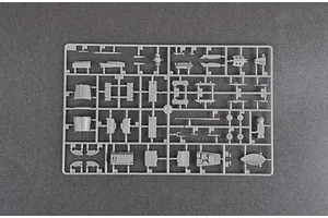 A grey plastic sprue containing various unpainted model aircraft parts for a 1/48 scale J-7B fighter jet kit.