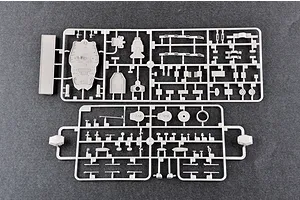 Two grey plastic model kit sprues containing various ship parts laid out on a dark surface.