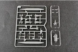 Plastic model kit sprues for a 1/72 scale F-106A Delta Dart, including grey weapon parts and clear canopy parts on a dark background.