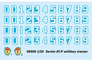 A decal sheet for the Trumpeter 1/35 Soviet AT-P artillery tractor model kit, featuring four rows of numbers 0-9 and two Soviet Guard badges.