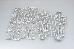 Four grey plastic model kit sprues containing various small parts for a 1/700 scale battleship model.